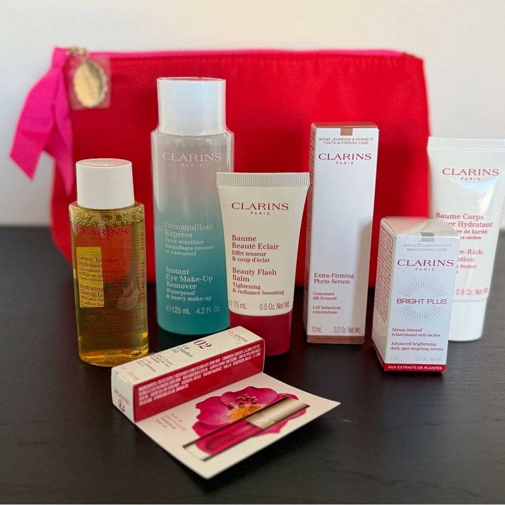 Clarins Skincare Collection with Lip Comfort Oil and Makeup Bag